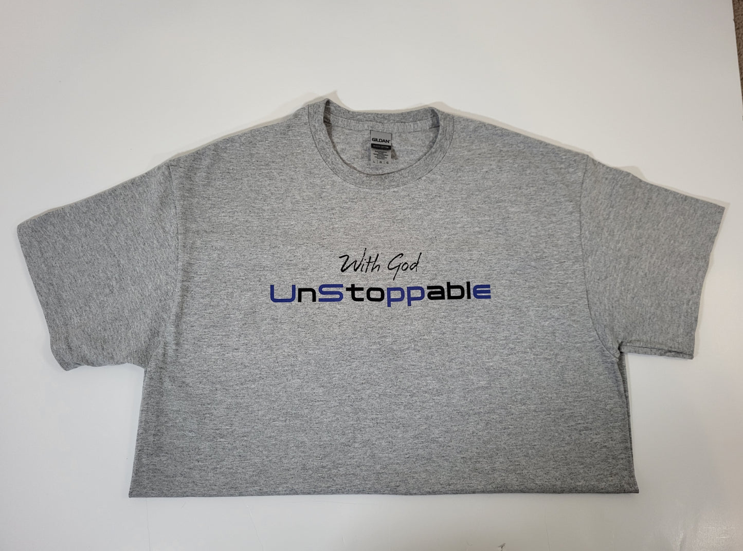 With God Unstoppable Men's Gray Short Sleeve T-Shirt with Black/Blue Lettering